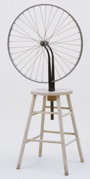 Marcel Duchamp. Bicycle Wheel. New York, 1951 (third version, after lost original of 1913). Metal wheel mounted on painted wood stool, 51 × 25 × 16 1/2ʺ (129.5 × 63.5 × 41.9 cm). The Sidney and Harriet Janis Collection. © 2016 Artists Rights Society (ARS), New York / ADAGP, Paris / Estate of Marcel Duchamp