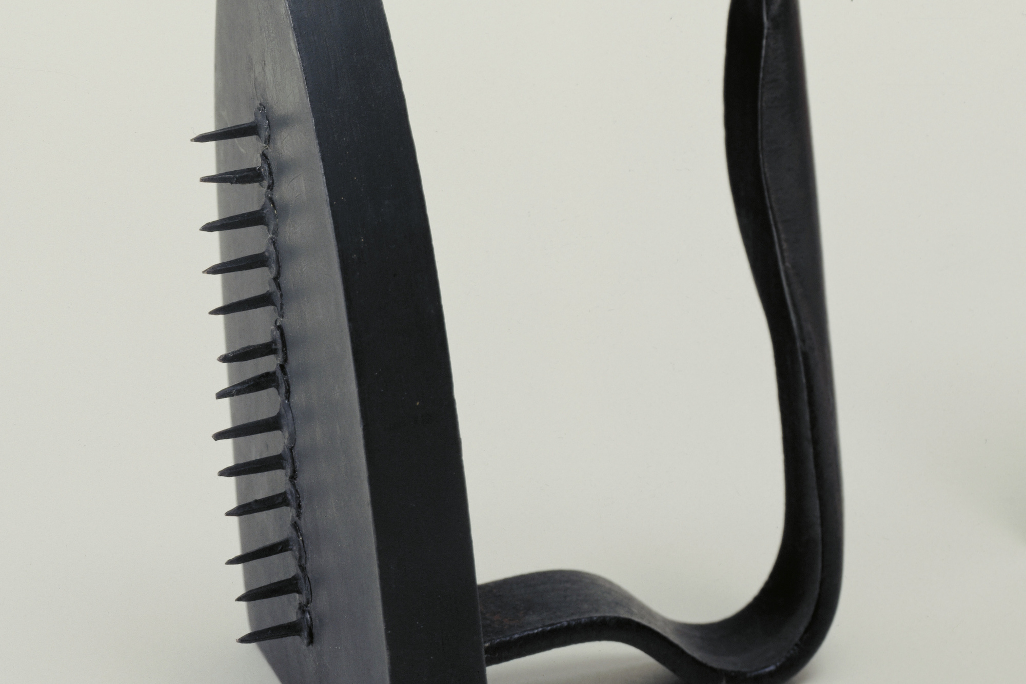 Man Ray. Gift. 1958; replica of 1921 original. Painted flatiron with row of thirteen tacks, heads glued to the irons bottom, 6 1/8 × 3 5/8 × 4 1/2″ (15.3 × 9 × 11.4 cm). James Thrall Soby Fund. © 2016 Man Ray Trust / Artists Rights Society (ARS), New York / ADAGP, Paris