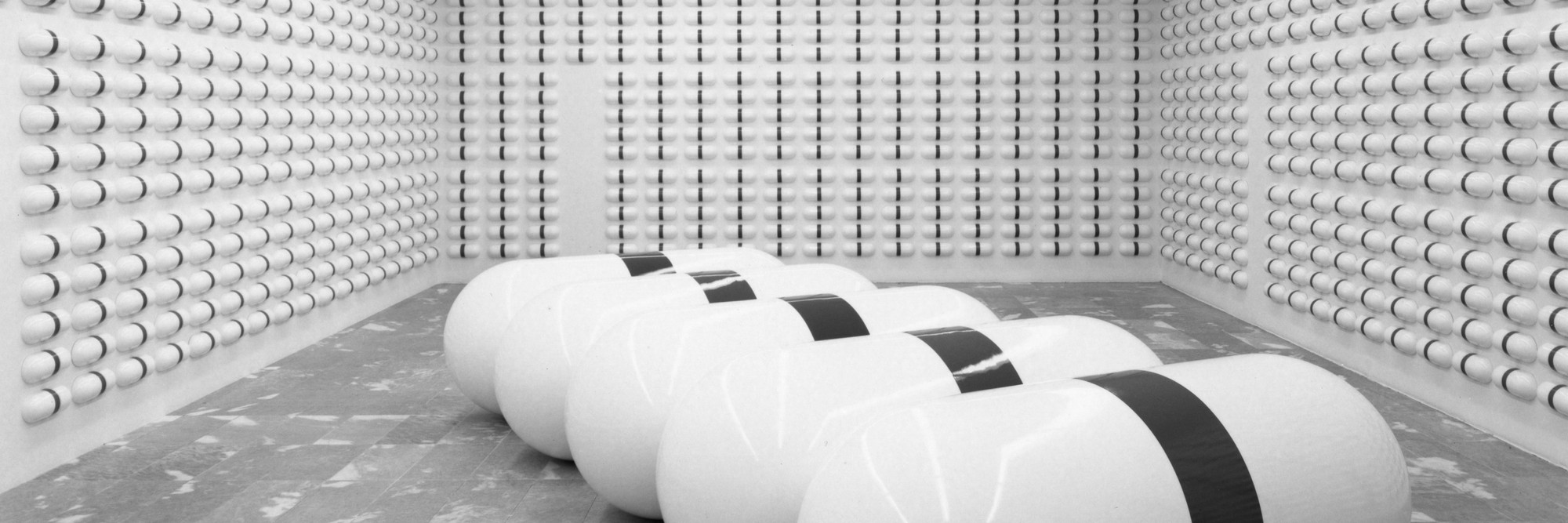 General Idea. One Day of AZT and One Year of AZT. 1991. Five units of fiberglass, each 33 7/16″ × 84 1/8 × 33 7/16″; 1,825 units of vacuum-formed polystyrene with vinyl, each 4 7/8 × 12 3/8 × 3″. Collection National Gallery of Canada, Ottawa. Installation view at The Museum of Modern Art, New York. Photo: Erik Landsberg