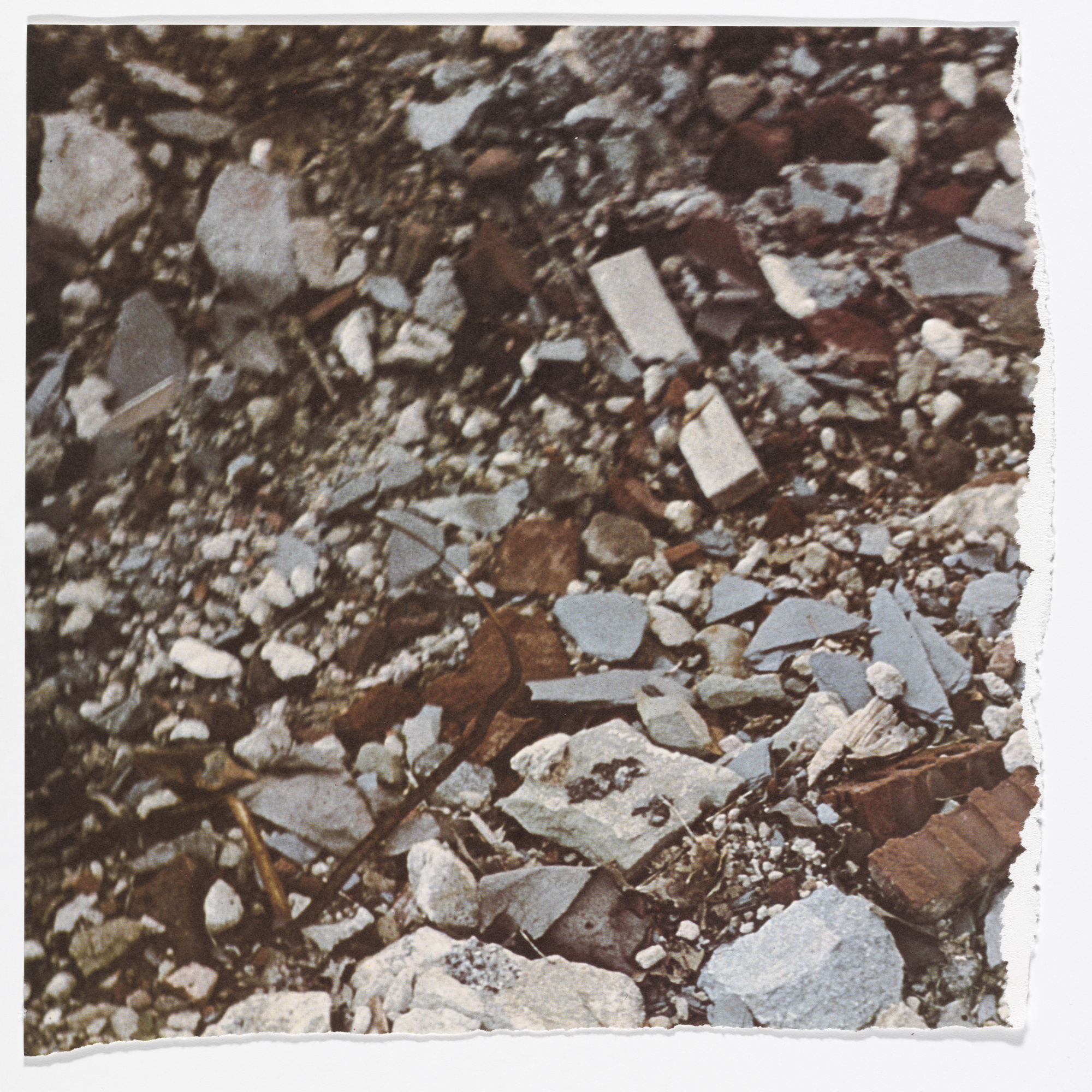 Robert Smithson. Torn Photograph from the 2nd Stop (Rubble) (2nd Mountain of Six Stops on a Section) from Artists & Photographs. 1970. Offset lithograph, torn into four pieces from a portfolio of nineteen printed objects (including box cover), ea. approx. sheet 10 7/8 × 11″ (27.6 × 28 cm). Gift of Kynaston McShine