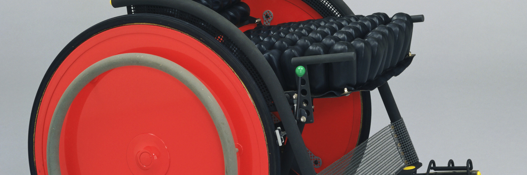 Kazuo Kawasaki. Carna Folding Wheelchair. 1989. Manufacturer: SIG Workshop Co. Ltd., Ishikawa, Japan. Titanium, rubber, and aluminum honeycomb, 33 × 22 × 35 1/4″ (83.8 × 55.9 × 89.5 cm). Gift of the designer