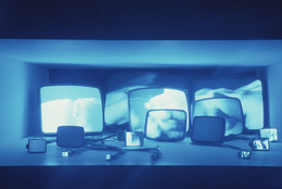 Gary Hill. Inasmuch As It Is Always Already Taking Place. 1990. Sixteen-channel video (black and white, sound), 16 black and white TV tubes and wires. Recessed in a wall 42″ (106.7 cm) from the floor, overall 16 × 53 3/4 × 68″ (40.6 × 136.5 × 172.7 cm). Gift of Agnes Gund, Marcia Riklis, Barbara Wise, Margot Ernst and purchase. © 1990 Gary Hill. Installation view of Video Spaces: Eight Installations at The Museum of Modern Art, New York