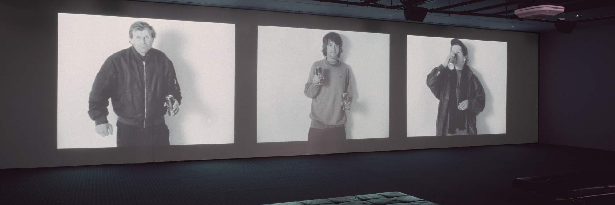 Gillian Wearing. Drunk. 1997–1999. Three-channel video (black and white, sound), 28:35 min. Dimensions variable; approximately 13′ × 37′ × 22' (396.2 × 1127.8 × 670.6 cm). Gift of Nina and Gordon Bunshaft, The Ken and Judith Joy Family Foundation, Barbara Foshay, and Margot P. Ernst. © 2016 Gillian Wearing