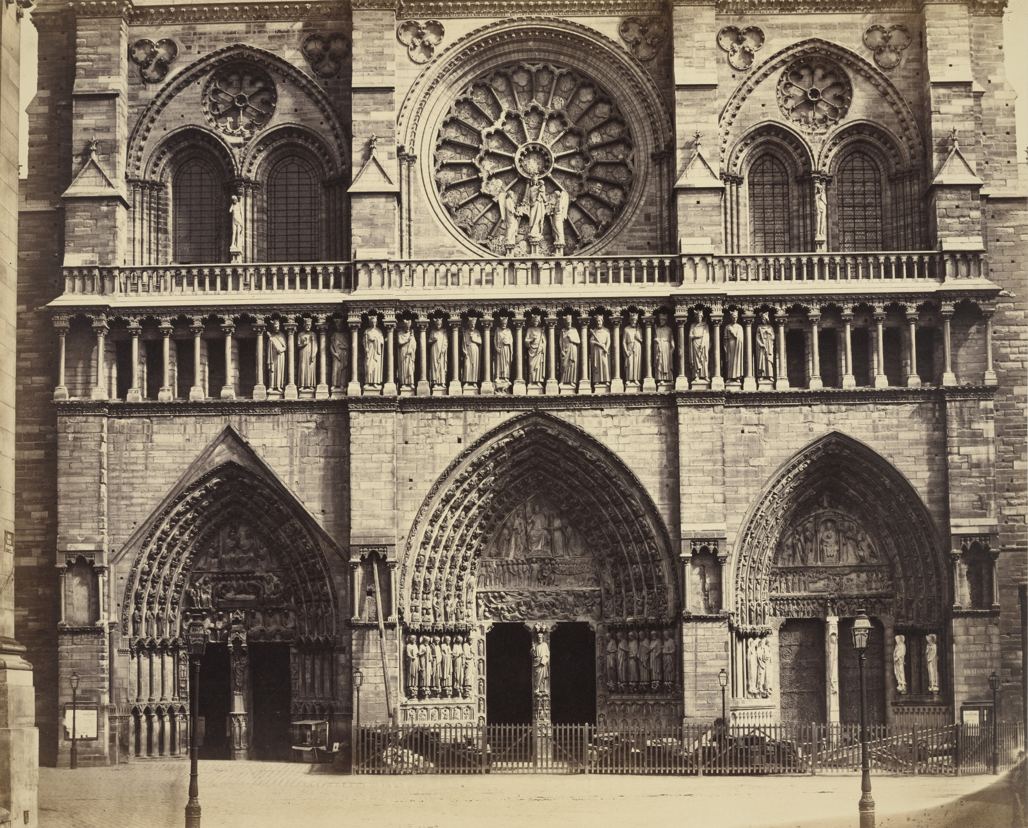 Louis-Auguste Bisson (French, 1814–1876) and Auguste Rosalie Bisson (French, 1826–1900). Cathedral of Notre Dame, Paris (Detail of Facade). c. 1853. Albumen silver print from a glass negative, 14 7/16 × 17 13/16″ (36.6 × 45.3 cm). The Museum of Modern Art, New York. Acquired through the generosity of Robert B. Menschel