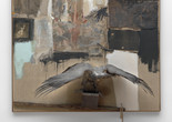 Robert Rauschenberg. Canyon. 1959. Oil, pencil, paper, metal, photograph, fabric, wood, canvas, buttons, mirror, taxidermied eagle, cardboard, pillow, paint tube and other materials, 81 3/4 × 70 × 24″ (207.6 × 177.8 x 61 cm). Gift of the family of Ileana Sonnabend. © 2016 Robert Rauschenberg Foundation/Licensed by VAGA, New York, NY