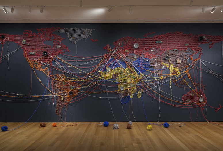 Installation view of Insecurities: Tracing Displacement and Shelter, The Museum of Modern Art, New York, October 1, 2016–January 22, 2017. © 2016 The Museum of Modern Art. Shown: Reena Saini Kallat. Woven Chronicle. 2011/16. Photo: Jonathan Muzikar