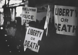 Gordon Parks. Harlem Rally, Harlem, New York. 1963. Gelatin silver print, 9 3/16 x 13 3/8&#34; (23.3 x 34 cm). Committee on Photography Fund. © 2016 Gordon Parks Foundation