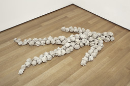 Installation view of the exhibition Alighiero Boetti: Game Plan, The Museum of Modern Art, New York, July 1–October 1, 2012. Alighiero Boetti. Io che prendo il sole a Torino il 19 gennaio 1969 (Me sunbathing in Turin 19 January 1969). 1969. 101 concrete stones, 69 11/16 × 35 7/16″ (177 × 90 cm). Private collection, Turin. © 2011 Artists Rights Society (ARS), New York/SIAE, Rome