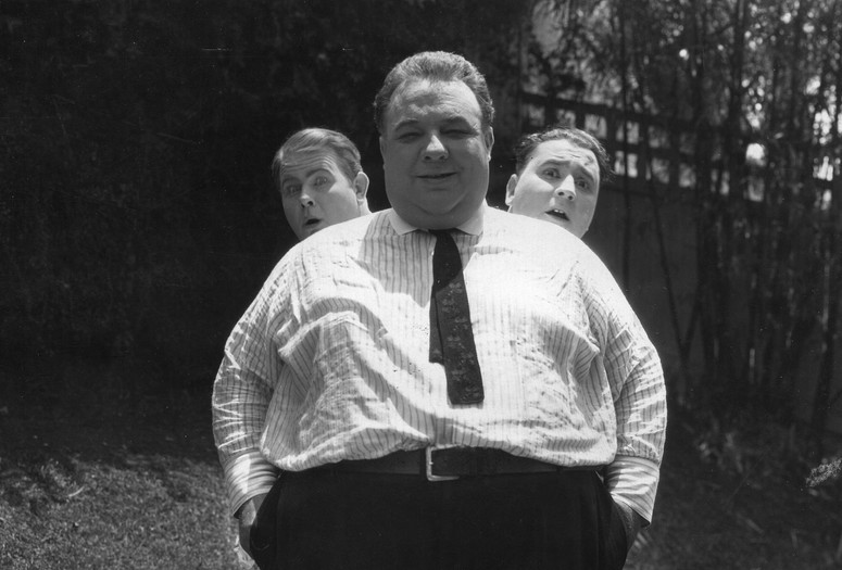 Publicity shot of A Ton of Fun. Frank “Fatty” Alexander front, Hilliard “Fatt” Karr back, left, and Bill “Kewpie” Ross back right