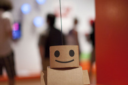 Kacie Kinzer. Interactive Telecommunications Program, Tisch School of the Arts, New York University. Tweenbot. 2009. Cardboard, paper, ink, batteries, motor, and wheels, 36 x 8 1/2 x 14&#34; (91.4 x 21.6 x 35.6 cm). Installation view at The Museum of Modern Art, 2011. Photo © Scott Rudd
