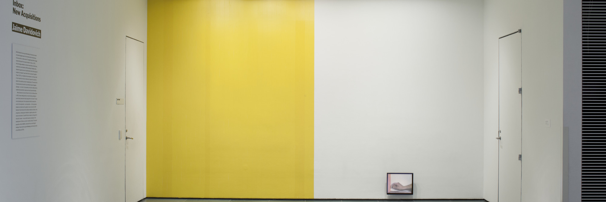 Installation view of Inbox: Jaime Davidovich at The Museum of Modern Art, New York. Shown: Jaime Davidovich. Tape Wall Project. 1970. Video (color, silent; 5 min.) and adhesive tape. Latin American and Caribbean Fund. © 2017 Estate of Jaime Davidovich. Photo: John Wronn