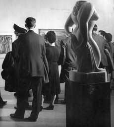 Unidentified visitors at the exhibition Americans 1942: 18 Artists from 9 States. Photographic Archive. The Museum of Modern Art Archives, New York. Photo: Albert Fenn