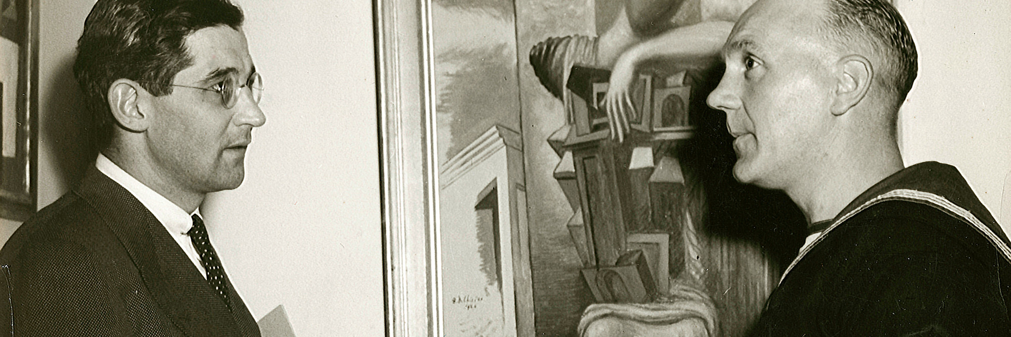 James Thrall Soby, Director of the Armed Services Program of the Museum of Modern Art, shown with an English sailor at the Service Party which inaugurated the Art Sale for Armed Services (May 6–June 16, 1942). Picture for sale on the wall is by Giorgio de Chirico. Photographic Archive. The Museum of Modern Art Archives, New York. Photo: Albert Fenn