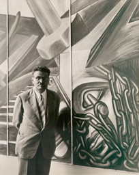 José Clemente Orozco with his fresco &#34;Dive Bomber and Tank,&#34; commissioned by MoMA during the exhibition &#34;Twenty Centuries of Mexican Art,&#34; May 15–September 30, 1940. Photographic Archive. The Museum of Modern Art Archives, New York
