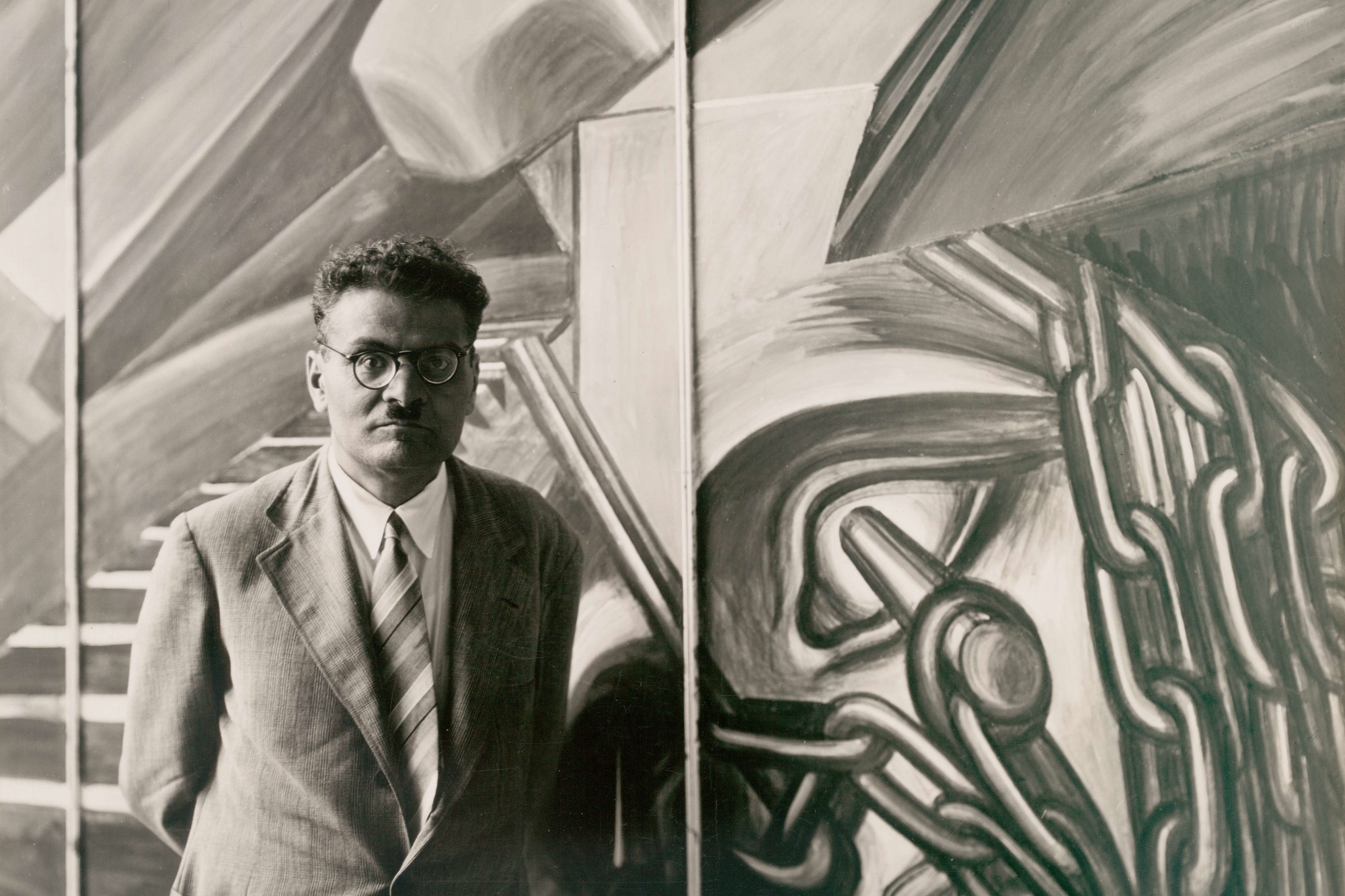 José Clemente Orozco with his fresco "Dive Bomber and Tank," commissioned by MoMA during the exhibition "Twenty Centuries of Mexican Art," May 15–September 30, 1940. Photographic Archive. The Museum of Modern Art Archives, New York