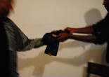 Terry Adkins and Kamau Amu Patton exchange a Lone Wolf Recital Corps sash at Third Streaming, New York, 2013