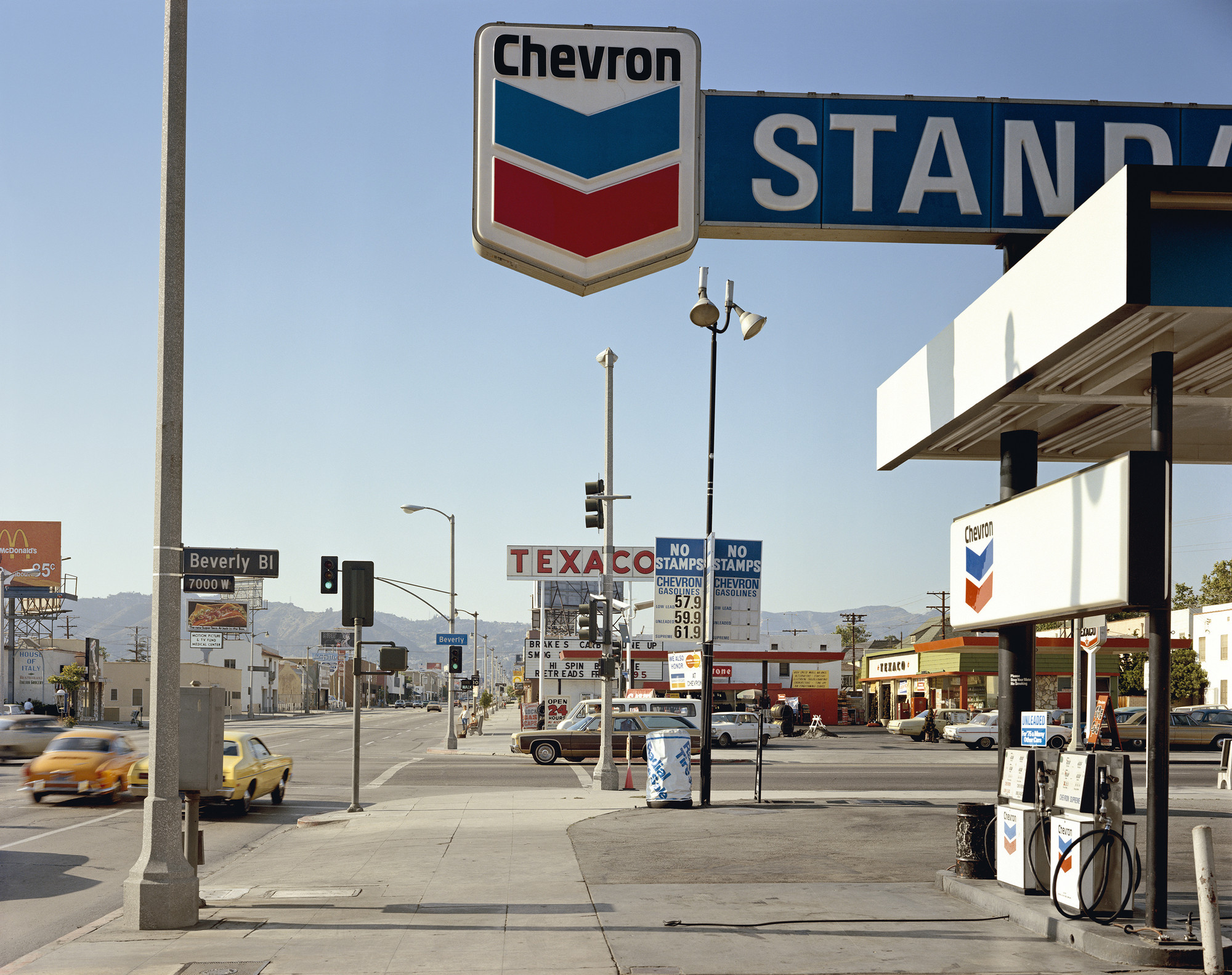 Stephen Shore (American, born 1947). _Beverly Boulevard and La Brea Avenue, Los Angeles, California, June 21, 1975._ 1975. Chromogenic color print, printed 2013, 17 x 21 3/4" (43.2 x 55.2 cm). The Museum of Modern Art, New York. Acquired through the generosity of Thomas and Susan Dunn, 2013
