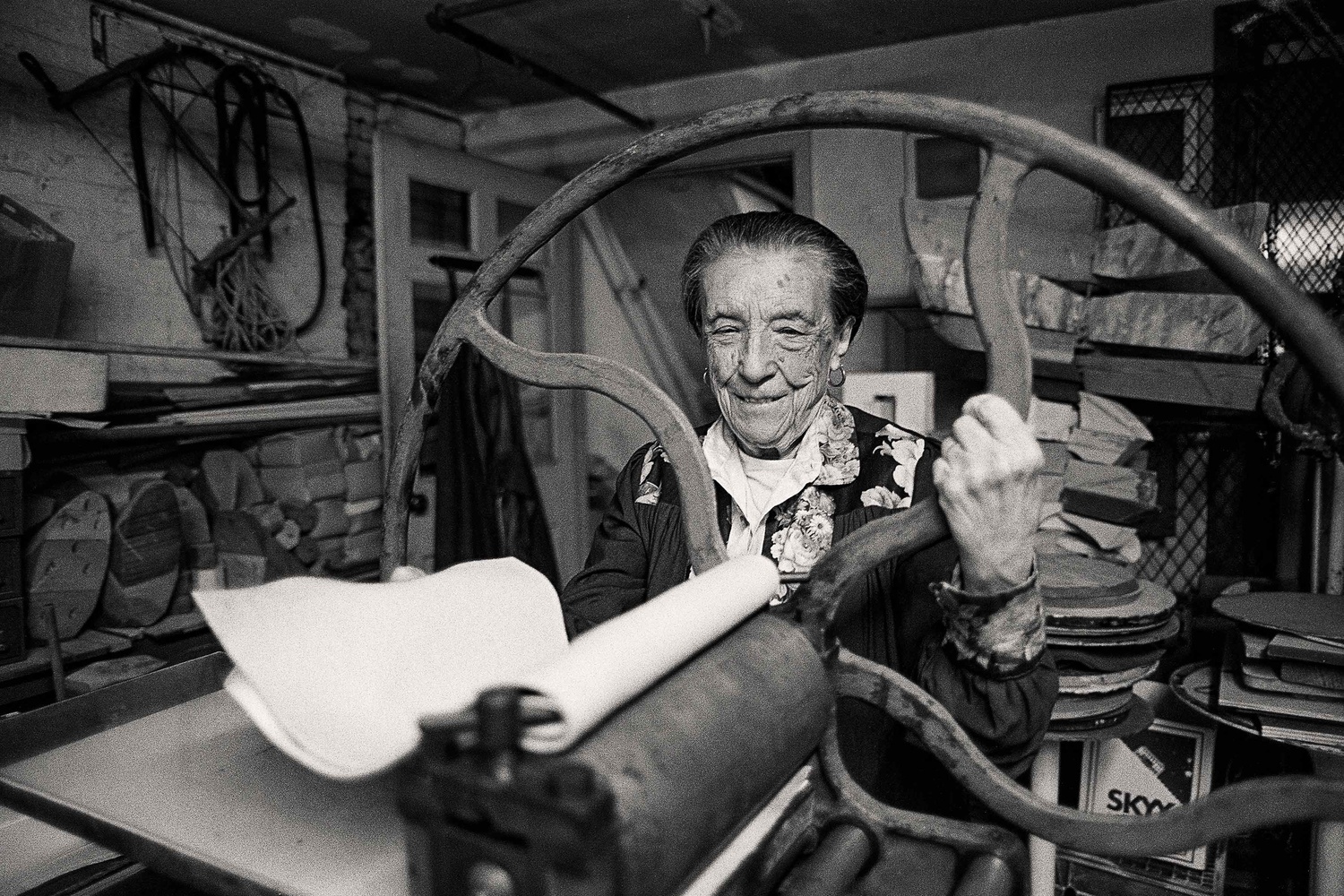 Louise Bourgeois at the printing press in the lower level of her home/studio on 20th Street, New York, 1995. Photograph: Mathias Johansson