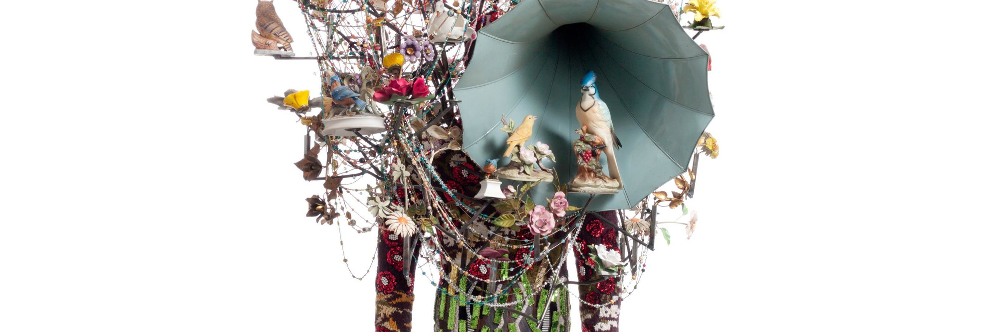 Nick Cave. Soundsuit. 2011. Found objects, knit head and bodysuit, and mannequin, 10&#39; 1&#34; x 42&#34; x 33&#34; (307.3 x 106.7 x 83.8 cm). The Museum of Modern Art, New York. Gift of Agnes Gund in honor of Dr. Stuart W. Lewis. © 2018 Nick Cave. Photo: Imaging and Visual Resources Department, MoMA