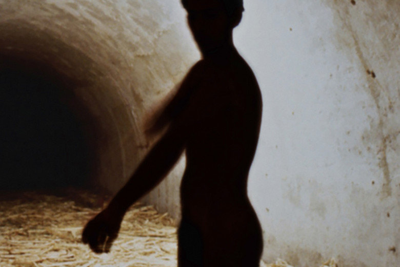 Tania Bruguera. Untitled (Havana, 2000), 2000. Sugar cane bagasse, video (black and white, silent; 4:37 min.), and live performance. Dimensions variable. The Museum of Modern Art, New York.The Modern Women's Fund and Committee on Media and Performance Art Funds. © 2018 Tania Bruguera. Installation view, Uno más cerca del otro, VII Bienal de La Habana. Fortaleza de San Carlos de la Cabaña, Galería de Contraminas de San Ambrosio, Havana (November 17, 2000). Image courtesy the artist. Photo: Casey Stoll.