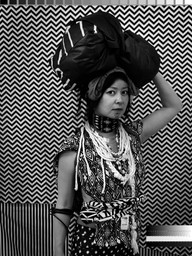 Stephanie Syjuco. Cargo Cults: Head Bundle. 2013-16. Pigmented inkjet print, 40 x 30 inches (101.6 x 76.2 cm). Courtesy the artist and Catharine Clark Gallery, San Francisco and Ryan Lee Gallery, New York. © 2018 Stephanie Syjuco