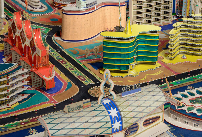 Bodys Isek Kingelez. Ville Fantôme (detail). 1996. Paper, paperboard, plastic, and other materials, 47 1/4 × 224 7/16 × 94 1/2″ (120 × 570 × 240 cm). CAAC – The Pigozzi Collection, Geneva. © Bodys Isek Kingelez. Photo: Maurice Aeschimann. Courtesy CAAC – The Pigozzi Collection