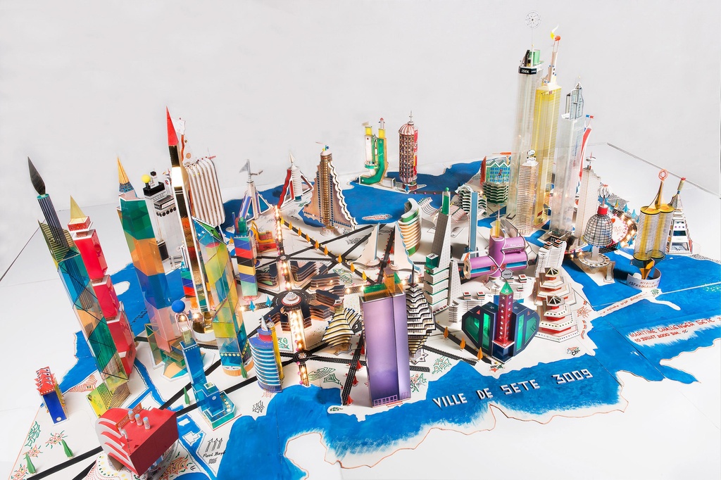 Bodys Isek Kingelez (Congolese, 1948-2015). Ville de Sète 3009. 2000. Paper, paperboard, plastic, and other various materials, 31 1/2 × 9′ 10 1⁄8″ × 6′ 10 11⁄16″ (80 × 300 × 210 cm). Collection Musée International des Arts Modestes (MIAM), Sète, France. © Pierre Schwartz ADAGP; courtesy Musée International des Arts Modestes (MIAM), Sète, France