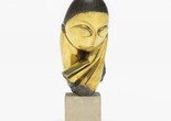 Constantin Brâncuși. Mlle Pogany. Version I, 1913 (after a marble of 1912). Bronze with black patina, 17 1/4 x 8 1/2 x 12 1/2&#34; (43.8 x 21.5 x 31.7 cm), on limestone base, 5 3/4 x 6 1/8 x 7 3/8&#34; (14.6 x 15.6 x 18.7 cm). Acquired through the Lillie P. Bliss Bequest (by exchange). © 2018 Artists Rights Society (ARS), New York/ADAGP, Paris