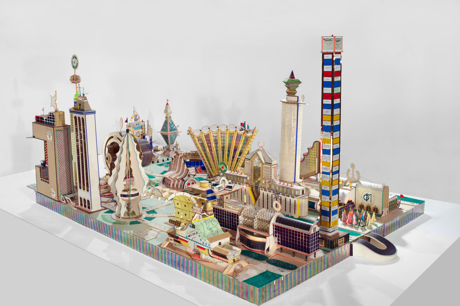 Bodys Isek Kingelez (Congolese, 1948–2015). Kimbembele Ihunga. 1994. Paper, paperboard, plastic, and other various materials, 51 3/16" × 72 13/16" × 10' 5" (130 × 185 × 320 cm). CAAC – The Pigozzi Collection, Geneva. © Bodys Isek Kingelez. Photo: Maurice Aeschimann. Courtesy CAAC – The Pigozzi Collection
