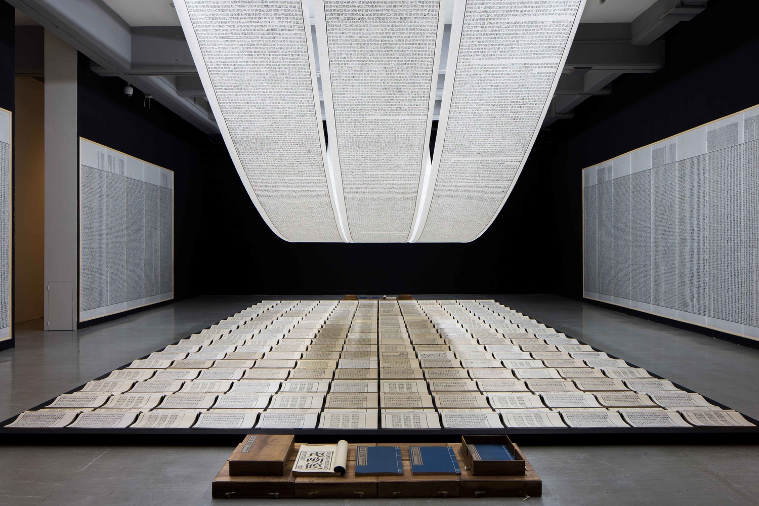 Xu Bing. Book from the Sky. 1987–91. Mixed media installation/hand-printed books and scrolls printed from blocks inscribed with “false” Chinese characters. Installation view at Taipei Fine Arts Museum, 2014. © Xu Bing Studio
