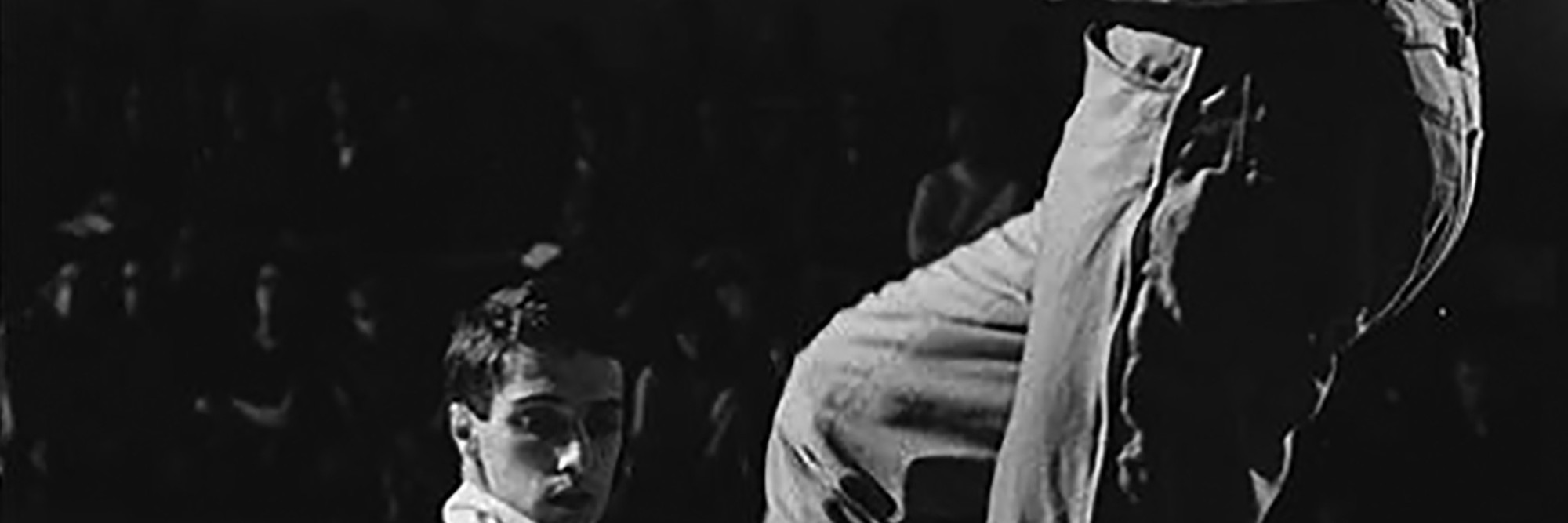 Stig T. Karlsson’s photograph of Steve Paxton (left) and Robert Rauschenberg (right) in Jag vill gärna telefonera (I Would Like to Make a Phone Call), 1964. Performed in Five New York Kvällar (Five New York Evenings), Moderna Museet, Stockholm, September 13, 1964. Courtesy Moderna Museet, Stockholm