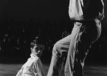 Stig T. Karlsson’s photograph of Steve Paxton (left) and Robert Rauschenberg (right) in Jag vill gärna telefonera (I Would Like to Make a Phone Call), 1964. Performed in Five New York Kvällar (Five New York Evenings), Moderna Museet, Stockholm, September 13, 1964. Courtesy Moderna Museet, Stockholm