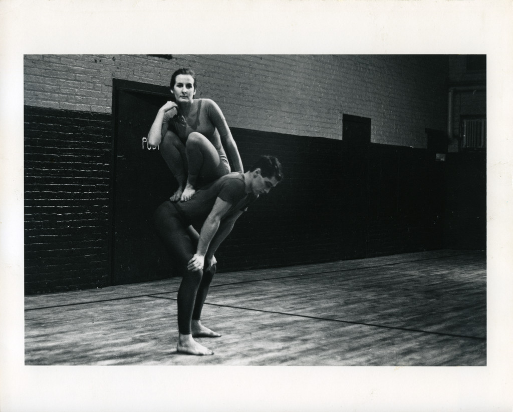 Peter Moore’s photograph of Trisha Brown and Steve Paxton in Brown’s _Lightfall_. Performed at _Concert of Dance #4_, Judson Memorial Church, January 30, 1963. © Barbara Moore/Licensed by VAGA, New York, NY. Courtesy Paula Cooper Gallery, New York