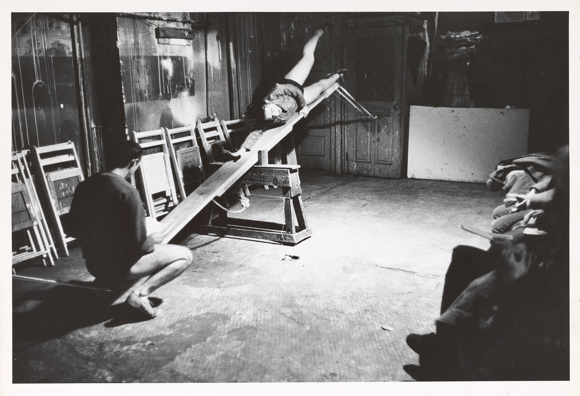 Robert McElroy’s photograph of Yvonne Rainer and Robert Morris in _See Saw_, 1960. © Robert R.
McElroy photographs of Happenings and early performance art, The Getty Research Institute, Los Angeles (2014.M.7). Image, Research Library, Getty Research Institute