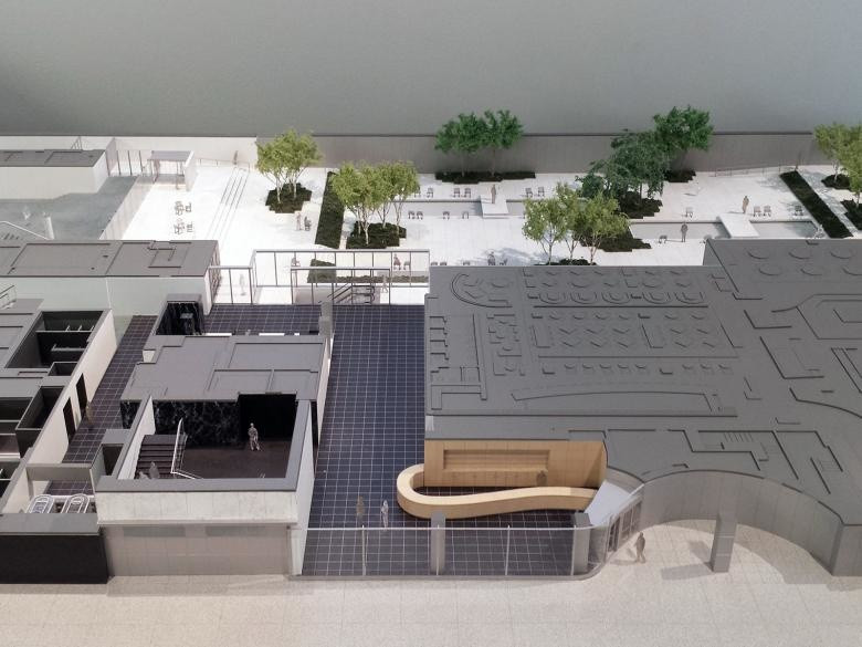A model on display at MoMA that shows the renovated ground-floor spaces and temporary entrance. Photograph by John Hill/World-Architects