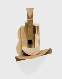 Pablo Picasso. Still life with Guitar. Variant state. Paris, assembled before November 15, 1913. Subsequently preserved by the artist. Paperboard, paper, string, and painted wire installed with cut cardboard box, Overall: 30 x 20 1/2 x 7 3/4" (76.2 x 52.1 x 19.7cm). The Museum of Modern Art, New York. Gift of the artist