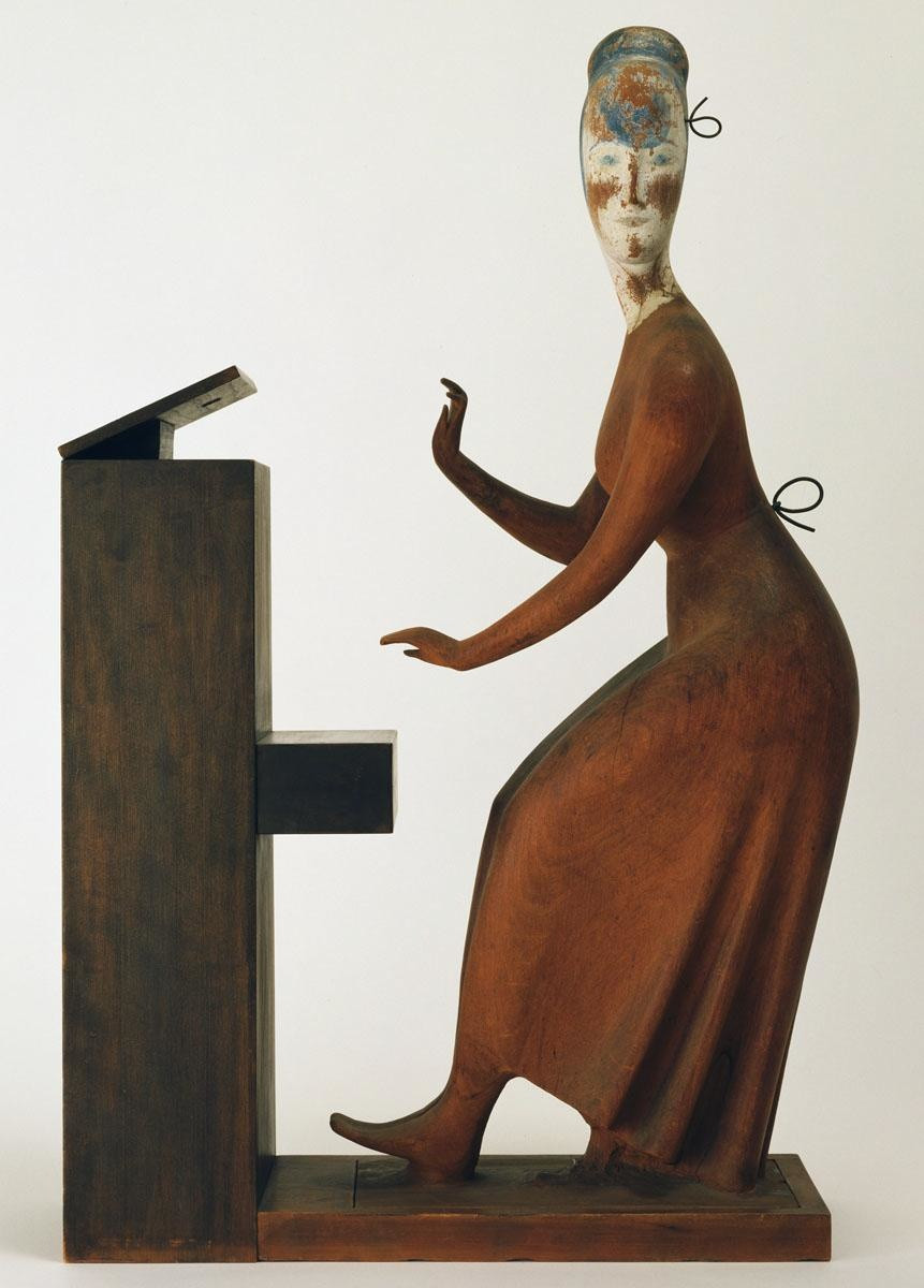 Elie Nadelman (American, born Poland, 1882–1946)
Woman at the Piano
c. 1917
Wood, stained and painted
35 1/8 x 23 1/4 x 9" (89.2 x 59.1 x 22.9 cm)
The Philip L. Goodwin Collection