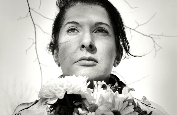 Marina Abramović. Portrait with Flowers. 2009. Black-and-white gelatin silver print; photo: Marco Anelli. © 2010 Marina Abramović. Courtesy the artist and Sean Kelly Gallery/Artists Rights Society (ARS), New York