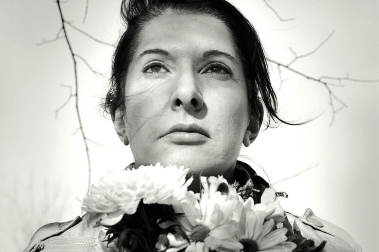 Marina Abramović. Portrait with Flowers. 2009. Black-and-white gelatin silver print; photo: Marco Anelli. © 2010 Marina Abramović. Courtesy the artist and Sean Kelly Gallery/Artists Rights Society (ARS), New York