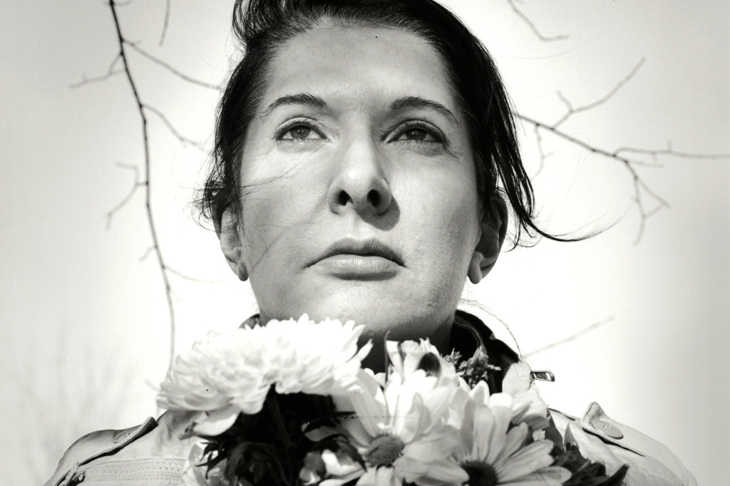 Marina Abramović. Portrait with Flowers. 2009. Black-and-white gelatin silver print; photo: Marco Anelli. © 2010 Marina Abramović. Courtesy the artist and Sean Kelly Gallery/Artists Rights Society (ARS), New York