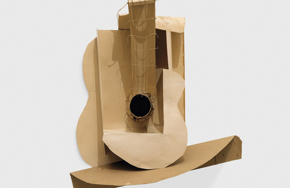Pablo Picasso. Still life with Guitar. Variant state. Paris, assembled before November 15, 1913. Subsequently preserved by the artist. Paperboard, paper, string, and painted wire installed with cut cardboard box, Overall: 30 x 20 1/2 x 7 3/4&#34; (76.2 x 52.1 x 19.7cm). The Museum of Modern Art, New York. Gift of the artist