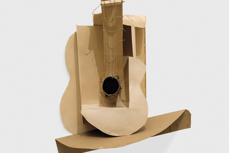 Pablo Picasso. Still life with Guitar. Variant state. Paris, assembled before November 15, 1913. Subsequently preserved by the artist. Paperboard, paper, string, and painted wire installed with cut cardboard box, Overall: 30 x 20 1/2 x 7 3/4&#34; (76.2 x 52.1 x 19.7cm). The Museum of Modern Art, New York. Gift of the artist