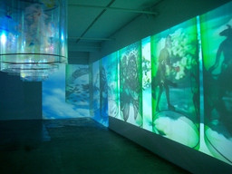 Nalini Malani (Indian, born 1946). Gamepieces. 2003/2009.Four-channel video/shadow play (color, sound: 12 min) and synthetic polymer paint on six Lexan cylinders, dimensions variable. The Museum of Modern Art, New York. Gift of the Richard J. Massey Foundation for Arts and Sciences, 2007. © 2015 Nalini Malani