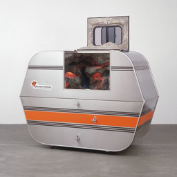 Andrea Zittel, A-Z Escape Vehicle: Customized by Andrea Zittel, 1996. Exterior: steel, insulation, wood and glass. Interior: colored lights, water, fiberglass, wood, papier-mâché, pebbles and paint, 62" x 7' x 40" (157.5 x 213.3 x 101.6 cm). The Norman and Rosita Winston Foundation, Inc. Fund and an anonymous fund. © 2012 Andrea Zittel.