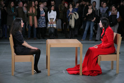 Installation view of Marina Abramović’s performance The Artist Is Present at The Museum of Modern Art, 2010. Photo by Scott Rudd. For her longest solo piece to date, Abramović will sit in silence at a table in the Museum’s Donald B. and Catherine C. Marron Atrium during public hours, passively inviting visitors to take the seat across from her for as long as they choose within the timeframe of the Museum’s hours of operation. Although she will not respond, participation by Museum visitors completes the piece and allows them to have a personal experience with the artist and the artwork. © 2010 Marina Abramović. Courtesy the artist and Sean Kelly Gallery/Artists Rights Society (ARS), New York