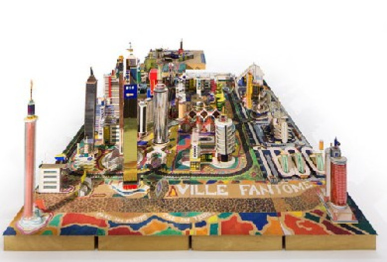 Bodys Isek Kingelez. Ville Fantôme. 1996. Paper, paperboard, plastic, and other materials, 47 1/4 × 224 7/16 × 94 1/2″ (120 × 570 × 240 cm). CAAC – The Pigozzi Collection, Geneva. © Bodys Isek Kingelez. Photo: Maurice Aeschimann. Courtesy CAAC – The Pigozzi Collection