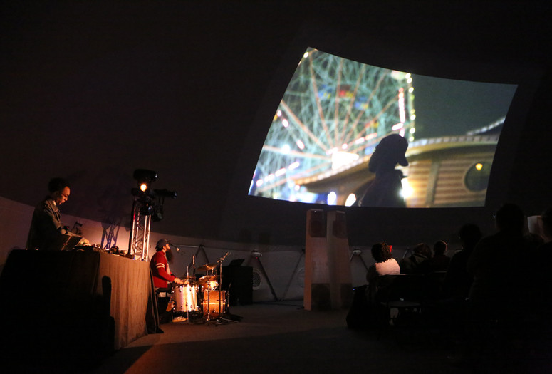 Cities, Dead and Alive (Despair is Not an Option): Jem Cohen and Luc Sante with Sukhdev Sandhu, Ryan Sawyer, and Jace Clayton on December 6, 2015. Presented at MoMA PS1 as part of VW Sunday Sessions 2015-2016. Photograph: Charles Roussel.