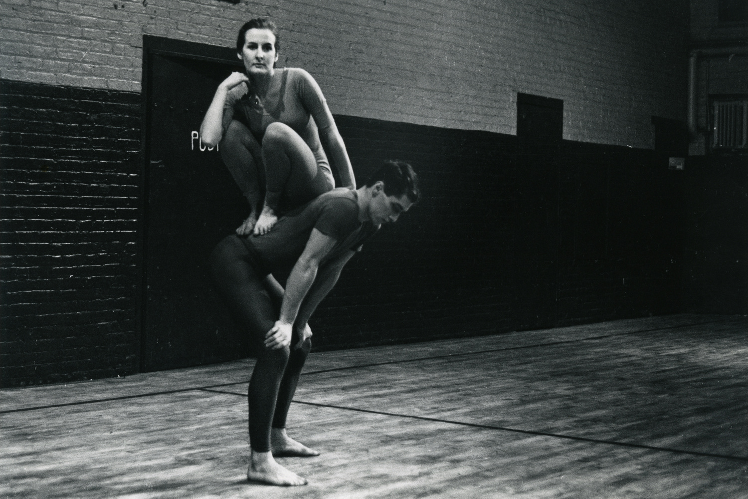 Peter Moore. Performance view of Trisha Brown and Steve Paxton in Brown’s Lightfall, Concert of Dance #4, January 30, 1963. © Barbara Moore/Licensed by VAGA, New York, NY. Courtesy Paula Cooper, New York