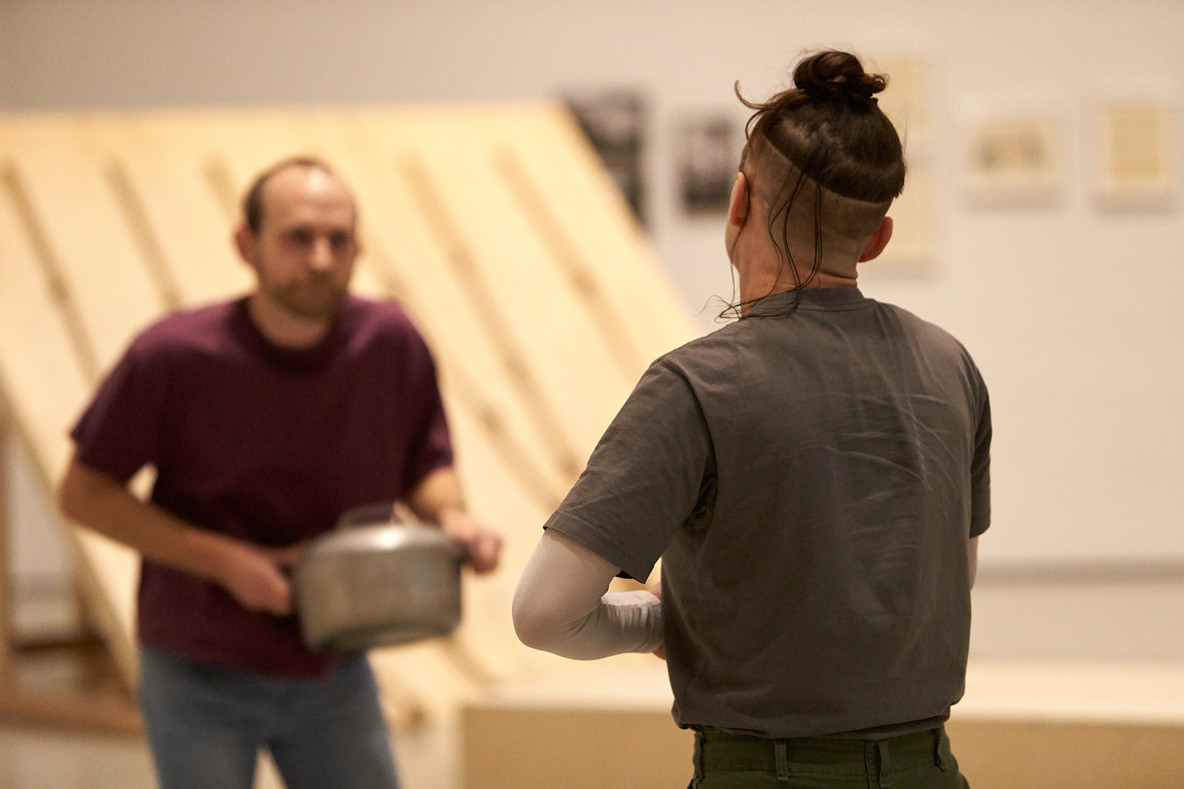 The quiet intimacy of Platforms is followed by an entirely different kind of duet. In Censor, Savannah Knoop sings loudly while Alex Rodabaugh shakes a pot full of nails and screws.
