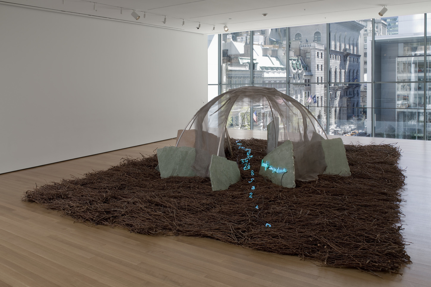 Mario Merz. Places with No Street. 1987. Aluminum, wire mesh, stones, twigs, neon tubing, and wires, overall dimensions variable, approximately 6' 6 3/4" x 21' x 28' (200 x 640.5 x 854 cm). Sid R. Bass Fund and Enid A. Haupt Fund. © 2019/Artists Rights Society (ARS), New York/SIAE, Rome